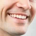 image of man smiling with slightly yellow teeth